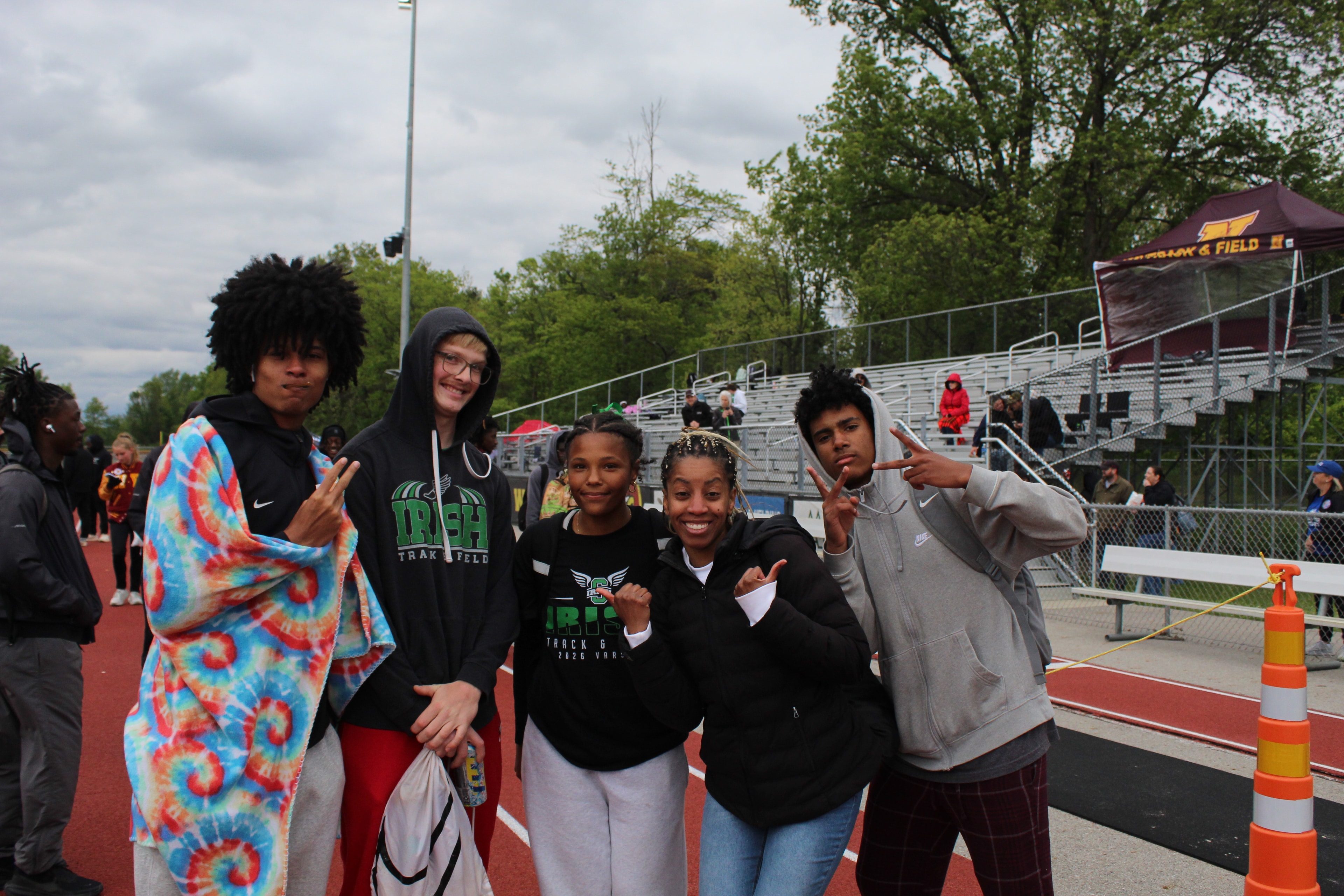 Irish athletes celebrating together at a meet