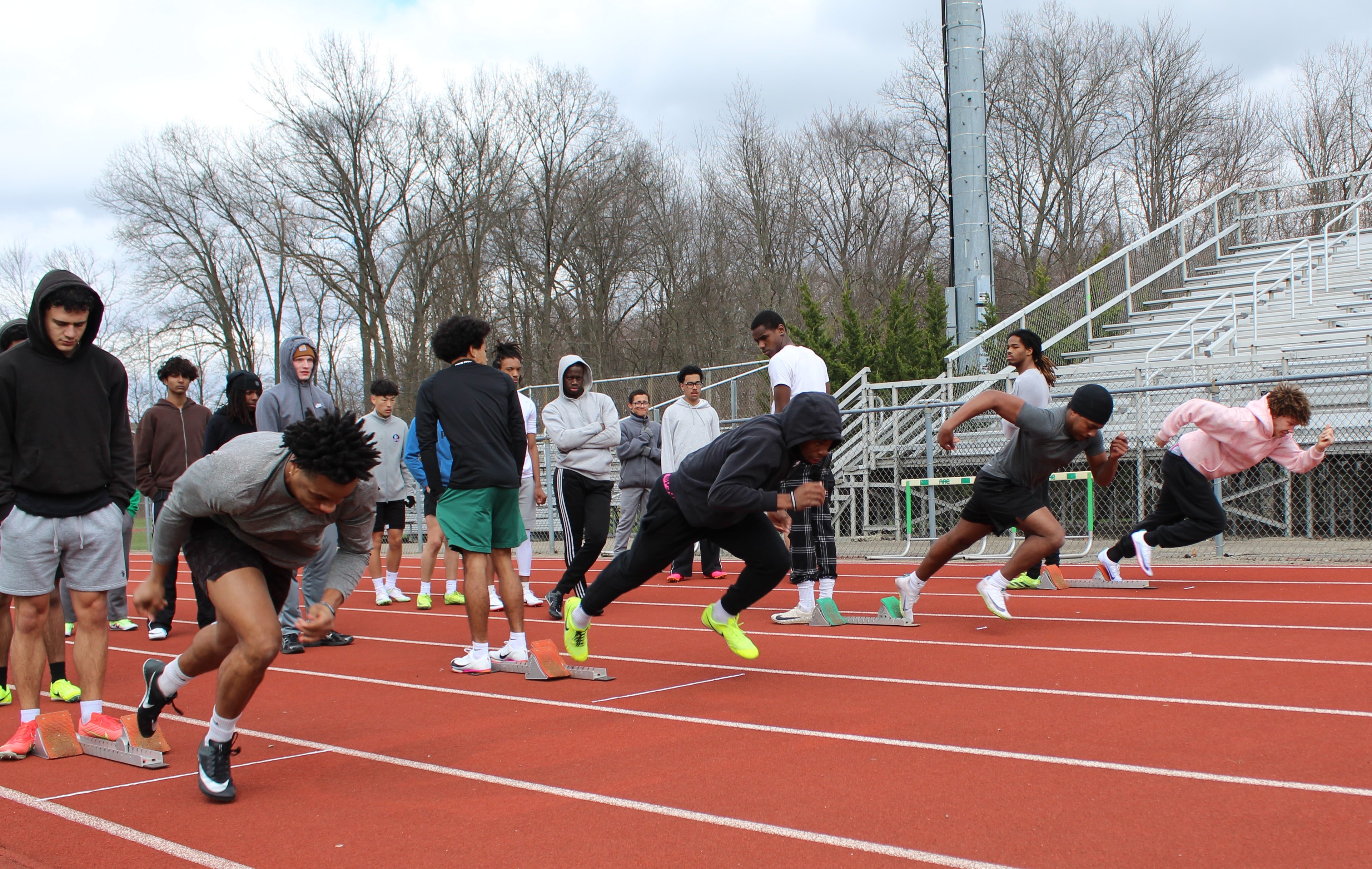 Athletes exploding off the starting blocks