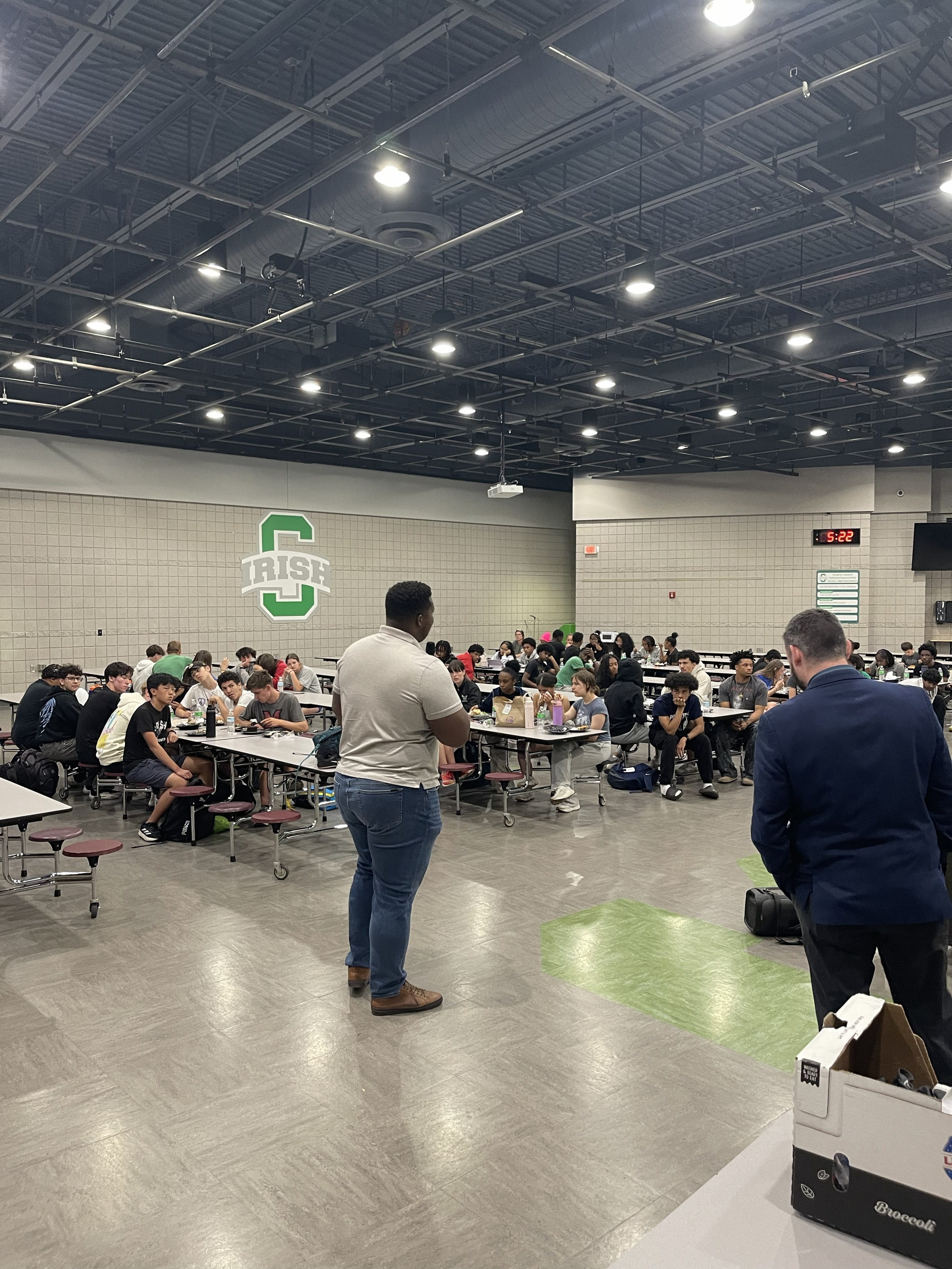 Full team gathered for a meal in the Scioto cafeteria