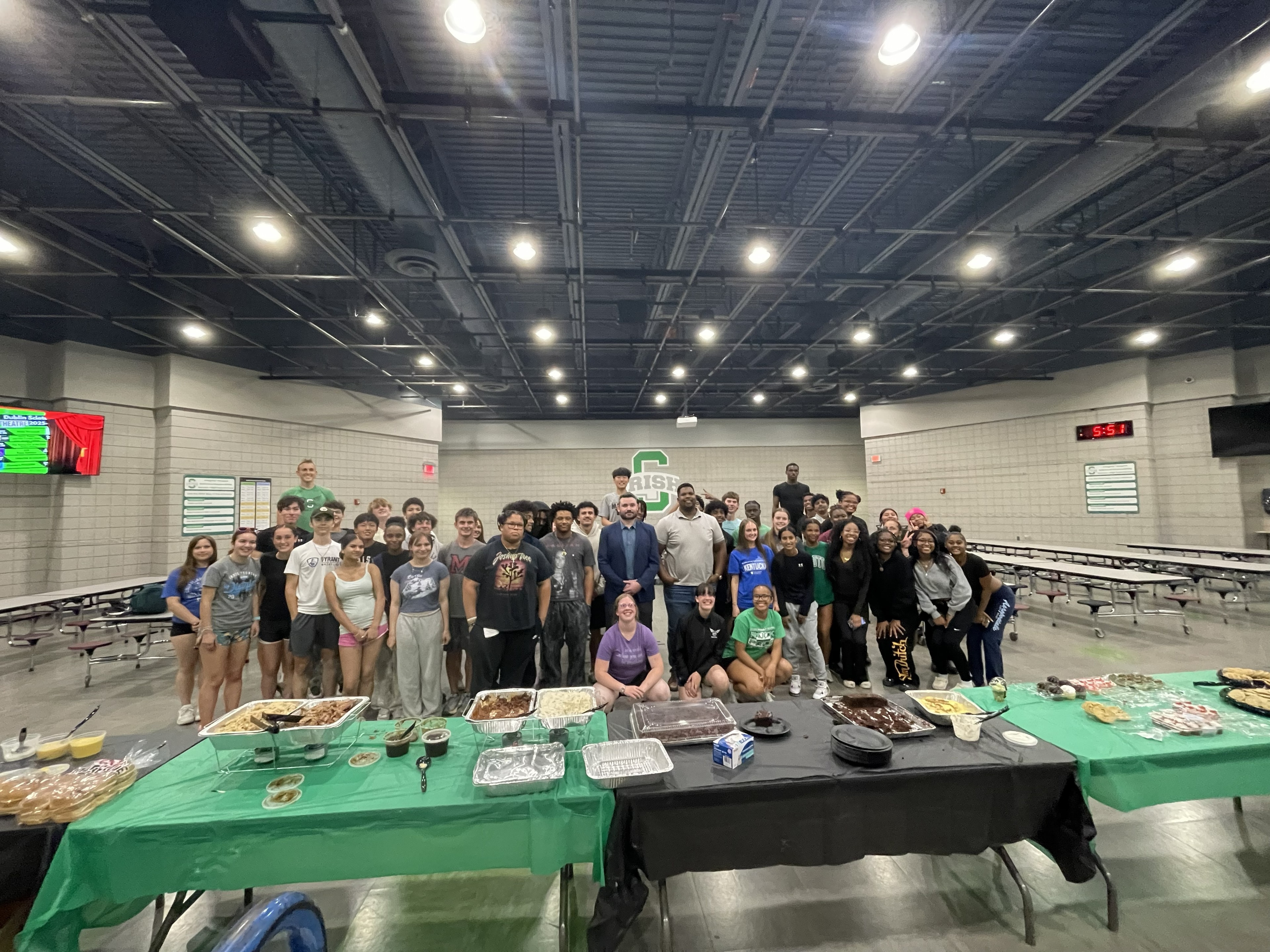 Full team group photo at the end of team meal